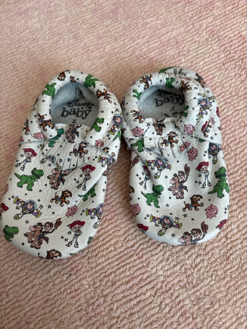 Freshly Picked White Baby Footies with Multicolor Toy Print